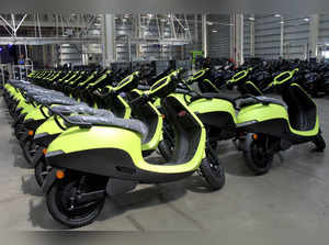 FILE PHOTO: Ola Electric's S1 Air e-scooters are pictured inside its manufacturing facility in Pochampalli
