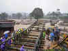 Indian soldiers building metal bridge to marooned area in Kerala landslides