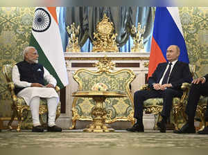 Indian Prime Minister Narendra Modi, left, and Russian President Vladimir Putin ...