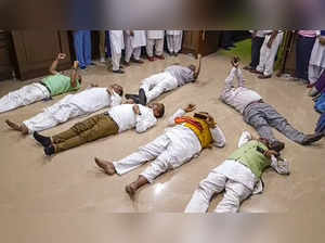 Ranchi: Jharkhand BJP MLAs lie on the floor during their protest inside the Jhar...