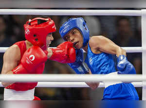 Paris: India's Nikhat Zareen (in blue) and China's Wu Yu during their women’s 50...
