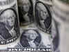 Dollar gains on geopolitical tensions, pound slips after rate cut