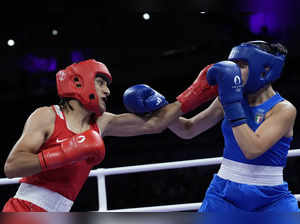 Imene Khelif, Algeria boxer who had gender test issue, wins first Olympic fight when opponent quits