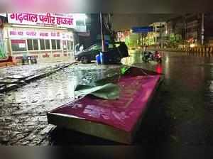 Hoarding falls on labourer walking by, wall collapses on elderly couple