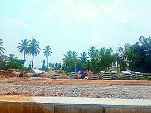 An empty plot of land where construction has been halted; the disputes are currently being heard in court