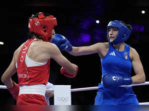 Who is Italian boxer Angela Carini and why did she quit her fight against Imane Khelif?