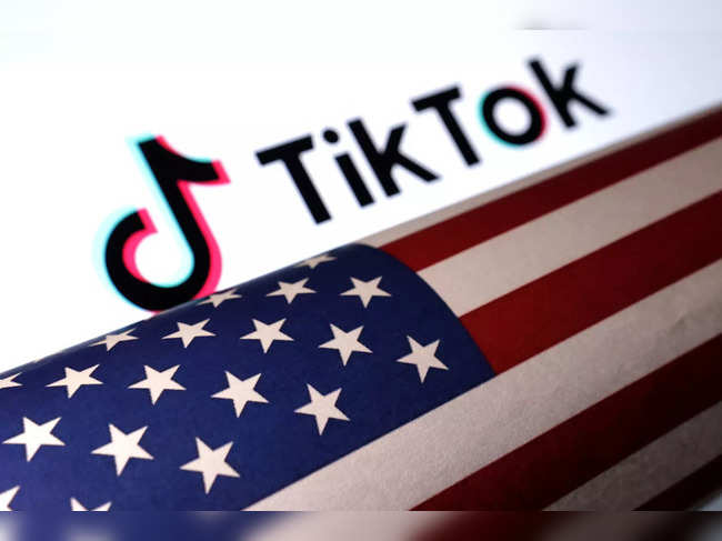 Illustration shows U.S. flag and TikTok logo