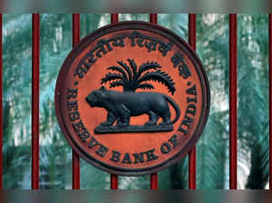 Reserve Bank of India logo is seen at the gate of its office in New Delhi