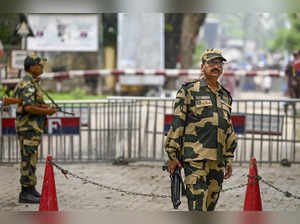 Dakshin Dinajpur: A Border Security Force (BSF) personnel stands guard at the In...