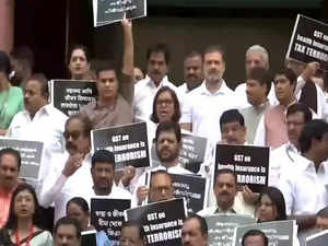 INDIA bloc protests on 18 percent GST on health and life insurance