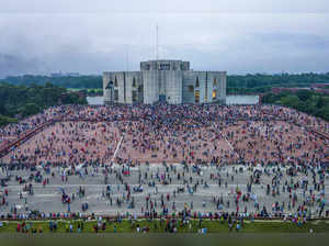 Dhaka : A photo taken with a drone shows people gather around at the Bangladesh ...