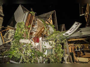 1 person dead and 8 believed trapped after part of a hotel on Germany's Mosel River collapses