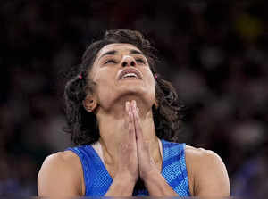 **EDS: FILE IMAGE** Paris: In this file image wrestler Vinesh Phogat reacts afte...