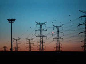 FILE PHOTO: Electrical pylons and power lines are seen in Yanqing district of Beijing