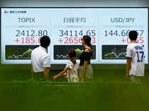 Japan's Nikkei tracks Wall Street declines, BOJ comments drag