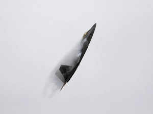 FILE PHOTO: An F-22 Raptor fighter jet performs maneuvers during the California International Airshow in Salinas