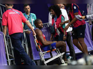 COVID-stricken Noah Lyles collapses after getting bronze, one of 8 US medals at Olympic track