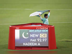 Arshad Nadeem, of Pakistan, poses for a photo after wining gold medal in the men...