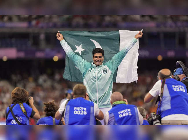 Paris: Pakistan's Arshad Nadeem celebrates after winning the gold medal in the m...