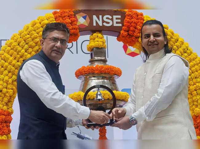 Ashish Chauhan MD and CEO of NSE Bhavish Aggarwal CEO of Ola ELECTRIC.