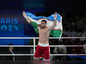 After coach's life was likely saved backstage, Uzbekistan dominates Olympic boxing tournament