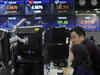 Asian shares enjoy the calm before inflation test