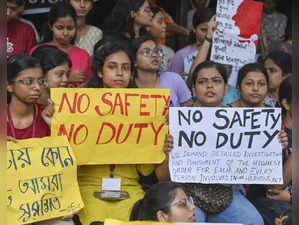 Kolkata: Doctors and nursing staff protest against the recent the rape and murde...