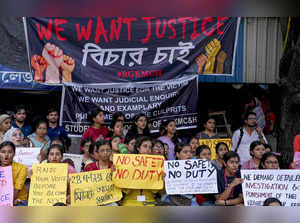 Kolkata: Doctors and nursing staff protest against the recent the rape and murde...