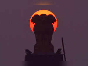 sunset behind the national emblem