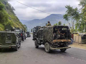 Doda: Army personnel near the site of an encounter between security forces and m...