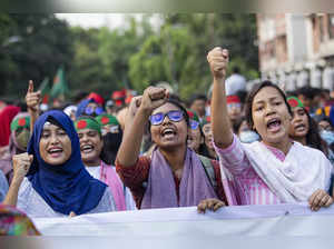 Students shout slogans during a protest demanding the trial of former Prime Mini...