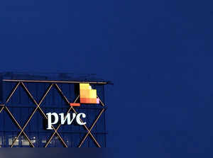 FILE PHOTO: The logo of PwC is seen on the top of a Brussels' office of the company