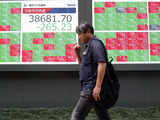 Japan's Nikkei rebounds on softer yen, tech gains