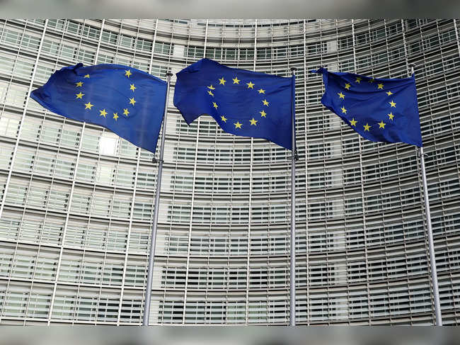 EU flags fly outside the European Commission in Brussels