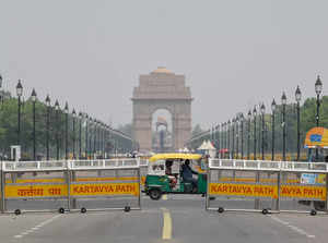 New Delhi, Apr 13 (ANI): An auto driver tries to ride past his three-wheeler tho...