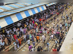 Thane: Angry people block railway tracks at Badlapur railway station in protest ...