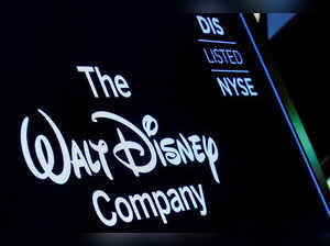 A screen shows the trading info for The Walt Disney Company company on the floor of the NYSE in New York