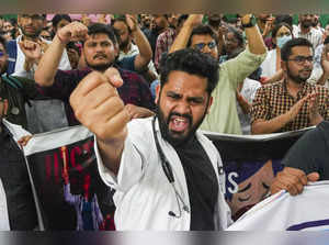 New Delhi: Doctors shout slogans during a protest over the RG Kar Medical Colleg...