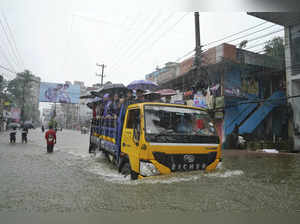 Floods maroon many people in Bangladesh and India and cause at least 15 deaths