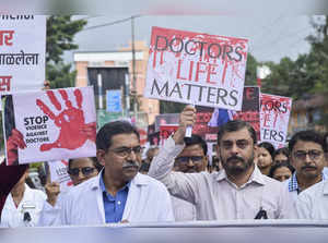 Karad: Members of Indian Medical Association (IMA) take part in a protest march ...