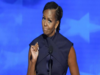 Michelle Obama at DNC says her parents were 'suspicious' of the wealthy but wears dress that costs nearly $3000