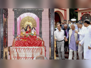 Bangladesh's Chief Adviser Muhammad Yunus with Hindu community members at the famous Dhakeshwari Temple