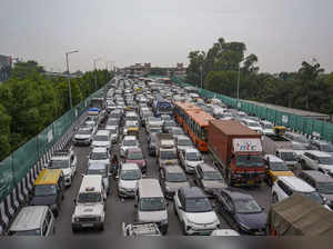 New Delhi: Vehicles during a traffic jam at Dhaula Kuan area after heavy rainfal...