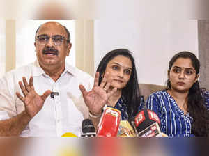 ​General Secretary of Association of Malayalam Movie Artists (AMMA) Siddique with actors Jomol and Ananya addresses the media