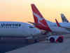 Qantas flight lands with damaged tyre & wing; Accidentally sells business class tickets at 85% discount