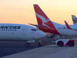 Qantas flight lands with damaged tyre & wing; Accidentally sells business class tickets at 85% discount