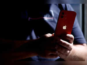 FILE PHOTO: An Apple iPhone 12 in a mobile phone store in Nantes