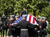 Trump entourage accused of shoving staff at hallowed US military cemetery