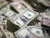 Dollar holds gains ahead of US inflation test