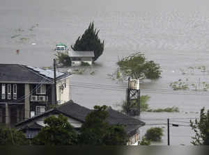 Typhoon lashes Japan with torrential rain and strong winds on a slow crawl north